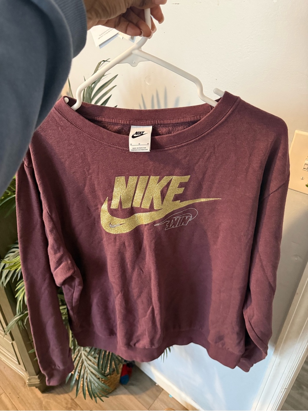 Nike Women's Burgundy Crewneck Sweatshirt with Gold Logo